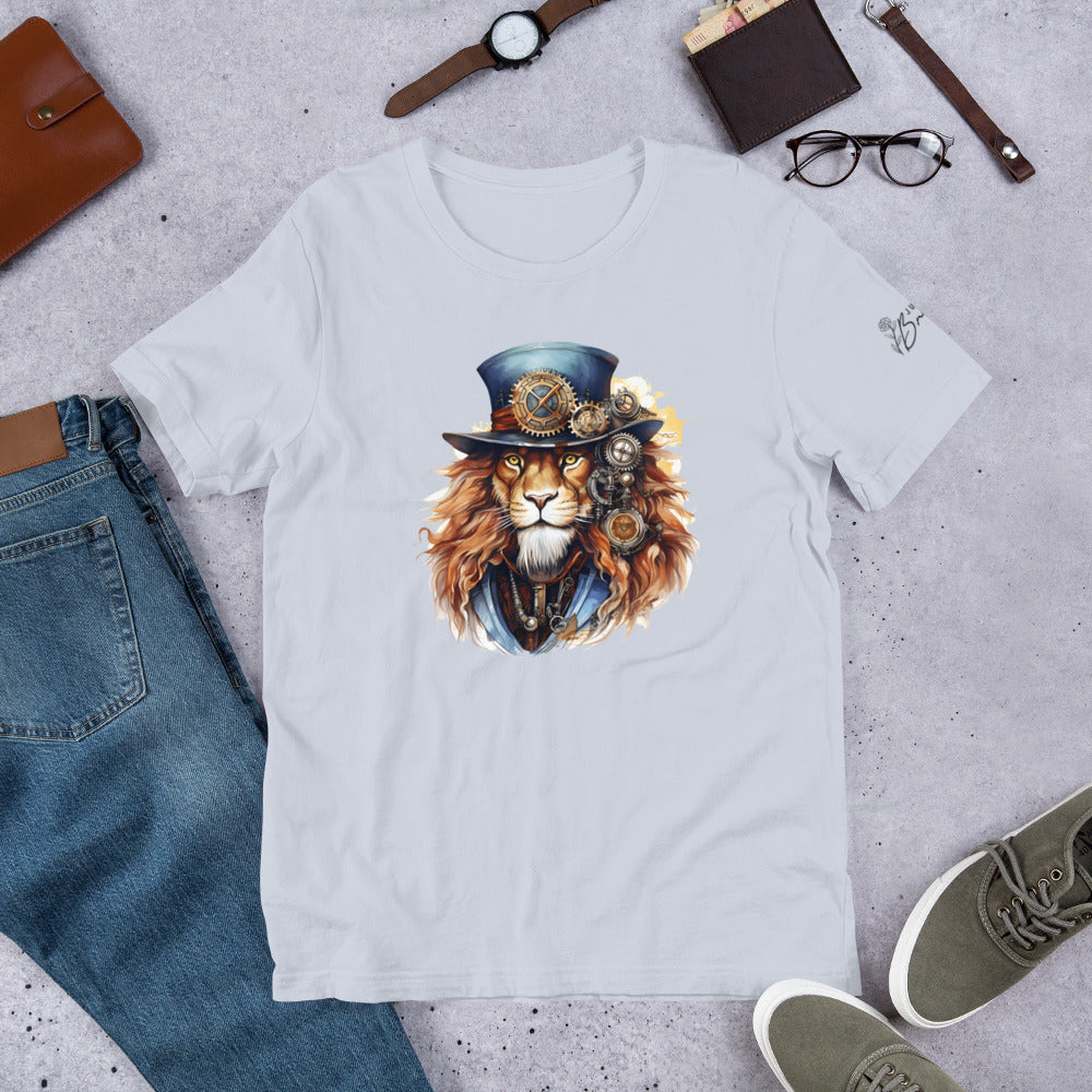 White t-shirt with a lion wearing a top hat design, surrounded by jeans, shoes, and accessories on a gray surface.